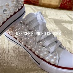 Custom Bling Chuck Sneakers Women’s Canvas Low Top Chuck Sneaker Lace-Up A Beautiful Pair Of Custom Crystal/Pearl Sneakers Will Take Your Entire Personality To The Next Level! We Specialize In Creating Personalized And Crystallized Sneakers Using The Best Elements Impress Everyone With Your Distinct Style By Wearing These One-Of-A Kind Sneakers White Pearl Chucks With Bling Crystals And Pearls Each Pair Comes With Extra Pearls And Crystals If Needed? Nwt Blingedsneakers.Com I Also Do Weddings Cu Pearl Tennis Shoes, Chucks And Pearls 2024, Converse With Pearls, Pearl Converse, Pearl Sneakers, Bling Sneakers, Classic Shoes Women, Converse Tennis Shoes, White Chuck Taylors