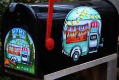 two mailboxes painted to look like campers