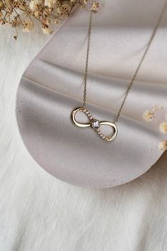 ABOUT PRODUCT 14K Gold Infinity Necklace, Gift for Her, Dainty Pendants, Minimalist jewelery,Women Necklace This 14K gold infinity  necklace is beautifully designed and hand crafted with our associates to make this a special gift for your loved ones. Knowing the value of our customers. We prepare each piece with extra care and attention. ITEM DETAILS Material: 14K Gold Approx: 1,90 gr Available colors: Gold, Rose Gold, White Gold Available Sizes: 14" to 20" ★ 14k Solid Gold (Certification will b Infinity Pendent Designs, Minimalist Infinity Necklace For Anniversary Gift, Minimalist Infinity Necklace For Anniversary, Minimalist Infinity Necklace In White Gold, Anniversary Infinity Necklace With Delicate Chain, Minimalist White Gold Infinity Necklace, Infinity Jewelry For Mother's Day, Delicate Infinity Necklace For Anniversary, Dainty Infinity Necklace As Gift For Her