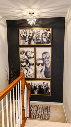 a staircase with pictures on the wall