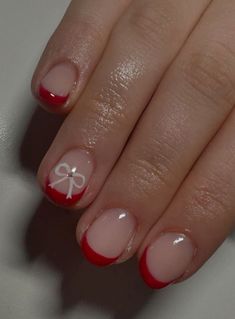 Red french tip, coloured french tip with white fine line bows, christmas nails, cute nails, bow nails, french tip nails with bows, builder gel, almond rounded nails, acrylic red french tip, acrylic french tip, bows on nails, nail inspo, christmas nails inspo, byab, builder gel, dark red nails, white bows nails French Tips With Small Heart, French Tip With Red Bow, Rounded Nails Acrylic, Red French Tips With Bow, White French Tip With Red Bow, Red Tip Manicure, Acrylic Red French Tip