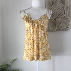 Description: Super Cute Flirty Feminine Yellow Floral Tie And Adjustable Spaghetti Strap V Neck Tank Top With A Ruffle At The Bust. Pulls On Overhead. Label: Candie's Size: M Material: 100% Rayon Condition: Nwt Measurements: Length: 27" Bust: 36" Waist: 34" Hips: 46" * I Ship Daily* Mint Green Tops, Cute Flirty, Light Blue Blouse, Velvet Tank Top, Tank Top Straps, V Neck Tank Top, Floral Tank Top, Floral Ruffle, Casual Tank Tops