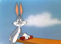 an animated rabbit standing on top of a piece of wood