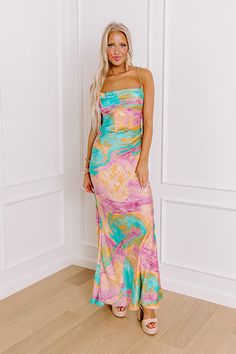 - Sip your sangria in style with this chic maxi! With a colorful marbled print and a fabulous gold colored chain accent at the back, this piece is giving luxe style vibes. Step into stunning style with this fabulous dress! - Unlined material with a satin finish and an abstract marbled print featuring pink, blue, and orange hues - A cowl neckline - This spaghetti straps that lace and tie at the back - A gold chain link accent draped across the back - Pleated accents at the side - A flattering sil Multicolor Floor-length Maxi Dress For Prom, Chic Flowy Maxi Dress With Vibrant Print, Multicolor Maxi Prom Dress, Multicolor Maxi Dress For Prom, Chic Fitted Maxi Dress With Vibrant Print, Elegant Multicolor Maxi Dress For Prom, Fitted Pink Maxi Dress With Vibrant Print, Orange Hues, Luxe Style