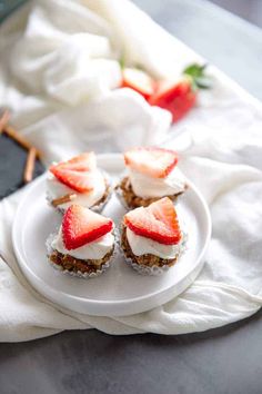 small desserts with strawberries on a white plate