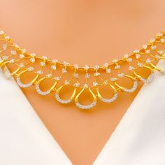 Featuring an 18k yellow gold necklace and matching earrings, this set weighs in at 24.3 grams. It is embellished with diamonds that total 2.07 carats, boasting a G-H color and VS quality, all cut in the round brilliant style. The necklace, measuring 17 inches, is designed with an elegant open drop style and is secured with a lobster lock, including three inches of adjustable links for the perfect fit. The set is accompanied by matching earrings, each 1.25 inches in length, with screw-back posts ensuring secure wear. This bright, open drop set combines classic elegance with contemporary design, making it a stunning addition to any sophisticated ensemble. PRODUCT DETAILS Gold Purity(karat): 18k Item Weight(grams): 24.3 Item Finish: Yellow Gold Stone: Diamond Diamond Weight(carats): 2.07ct Di Bridal Jewelry Necklace, Precious Stones Rings, Diamond Pendant Sets, Modern Bracelets, Fancy Necklace, Mens Gold Rings, Fancy Rings, 18k Gold Necklace, Diamond Bangles Bracelet