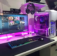 a desktop computer sitting on top of a desk next to a keyboard and mouse in front of a monitor