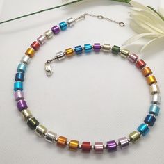 Modern necklace,  Ombre Necklace, Statement Necklace, Ladies necklace, Necklace woman Colorful,Handmade necklace, Beautiful multicolor necklace, Short necklace.    A necklace decorated with colors and will compliment you. A sequence of cylindrical beads that spectacular their colors. Power and beauty that blends and transmit a statement. You can wear this necklace for lunch when you are dress in light clothes. This necklace will do it all. ❃ SIZE ❃ Necklace Length: 18 inches (42 cm) 20 (50 cm) B Rainbow Bar, Ombre Necklace, Handmade Statement Necklace, Rainbow Necklace, Daughter Necklace, Geometric Necklace, Colorful Jewelry, Modern Necklaces, Jan 11