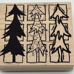 a rubber stamp with trees on it