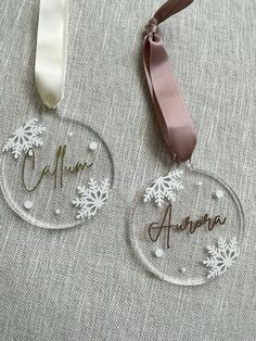 personalized acrylic ornament with ribbon on table