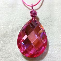 This Is A Super Beautiful And Sparkly, Pink Titanium Glass, Mirror Pendant. It Is So Flashy!!! I Hope You Can Tell How Gorgeous It Is From My Pictures. It Is Fabulous! Hand Wrapped With Pink Wire It Also Comes With A Matching Pretty Pink Corded Necklace With An Extension. The Pendant Measures 2 1/2"X 1 1/4". There Is One Tiny Little Chip On The Back, But It Does Not Show In The Front As You Can Tell From My Pictures. I Only Mention It Because I Wouldn't Want Someone To Not Know. My Last Photo Sh Sparkling Crystal Necklace For Gifts, Silver Bling Crystal Necklaces As Gift, Silver Adjustable Teardrop Crystal Necklace, Silver Adjustable Teardrop Crystal Necklaces, Silver Crystal Necklaces With Rhinestones For Gift, Silver Crystal Necklace With Rhinestones For Gift, Pink Crystal Necklace For Gift, Nickel-free Crystal Necklaces, Crystal Necklace With Teardrop Pendant For Gift