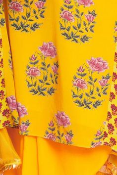 Ochre yellow panelled short kurta with all-over multi-color floral motif print. Comes with draped dhoti pants.
Component: 2
Embroidered, Printed
Neckline: Round
Sleeve Length: Full
Color: Yellow
Draped pants
Side panels
Tassel tie-up back - Aza Fashions Traditional Yellow Palazzo Set With Printed Motifs, Yellow Palazzo Set With Printed Motifs In Traditional Drape, Yellow Palazzo Set With Printed Motifs And Traditional Drape, Anarkali Sets With Printed Motifs In Yellow, Yellow Printed Motifs Anarkali Set For Festivals, Yellow Anarkali Set With Straight Kurta And Printed Motifs, Festive Yellow Sharara With Printed Motifs, Yellow Anarkali Set With Printed Motifs, Yellow Anarkali Set With Printed Motifs For Festivals