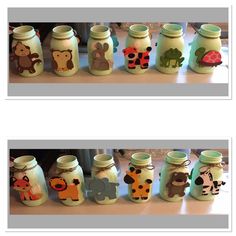 there are many jars with animals painted on them