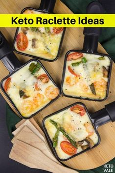 four square pans filled with food sitting on top of a wooden table next to a knife