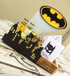 a batman themed wooden box on top of a table