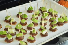 there are many desserts on the tray ready to be eaten