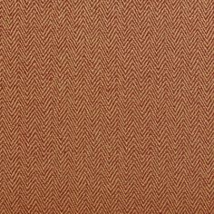 an orange and brown fabric textured with small herringbones on the outside of it