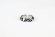 Silver plated cuban chain style ring for men.- Ring material: silver plated- Adjustable size, the ring can be adjusted.- Ring thickness: 0.2 inch (0.5cm)This ring is great as a gift for a man or a boy. All of our jewelry comes wrapped and ready for gift giving!Visit our shop for more similar items: http://www.etsy.com/shop/principles Minimalist Silver Midi Rings With Adjustable Chain, Silver Rings With Adjustable Chain For Everyday, Minimalist Metal Rings With Adjustable Chain, Silver Sterling Chain Ring Tarnish Resistant, Minimalist Metal Chain Promise Ring, Adjustable Minimalist Open Chain Ring, Minimalist Adjustable Sterling Silver Chain Ring, Adjustable Minimalist Chain Ring, Adjustable Minimalist Sterling Silver Chain Ring