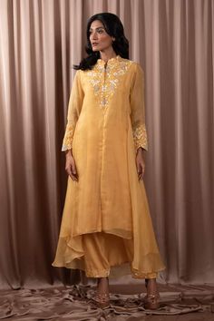 Yellow asymmetric tunic with floral resham and sequin embroidery. Paired with a pant. - Aza Fashions Festive Eid Kurta With Asymmetrical Hem, Anarkali Tunic Set With Floral Embroidery, Anarkali Set With Floral Embroidery Tunic, Festive Anarkali Kurta With Asymmetrical Hem, Eid Embroidered Kurta With Asymmetrical Hem, Embroidered Asymmetrical Hem Kurta For Eid, Festive Asymmetrical Hem Kurta For Eid, Eid Festive Kurta With Asymmetrical Hem, Festive Kurta With Dupatta And Asymmetrical Hem