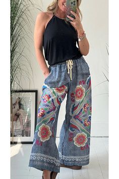 Details
	Size Chart



	
	
		
		
			
			
				These hippie print trousers combine the classic look of denim with a unique printed floral design. The elasticated waistband features a drawstring for comfort and style. In addition to its long, wide legs, these pants offer a flattering and stylish silhouette.
				 
				 
				
					Length: Ankle-Length
					Material: Polyester
					Elasticated waist with ties
					Style: Vacation Wear
					Fit Style: Loose Fit
				
				
				@Note:
				Size: please check measurements carefully
				Please allow 0.5-1" difference due to manual measurement
				Different monitor settings means colors may differ slightly
				1" = 2.54cm
				@
				
				
				

				
					
						
							Size(inch)
							Waist
							Hips
							Bottom length
						
						
							S Denim Print, Floral Print Pants, Summer Lace, Winter Pants, Vacation Wear, Floral Denim, Printed Trousers, Tie Styles, Jeans Outfit