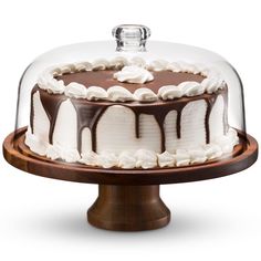 a chocolate cake with white frosting on top