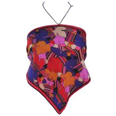 For Sale on 1stDibs - This Mary Quant top is composed of an abstract printed silk and features a rhinestone neck tie with a halter style. There are some rhinestones missing Mary Quant, 1970s Fashion, Halter Style, Printed Silk, Tie Top, Silk Ties, Silk Printing, Neck Tie, High Fashion