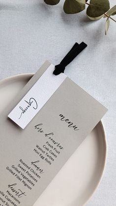 a white plate topped with a menu card