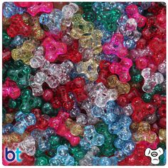 many different colored beads are in the shape of teddy bear heads, and there is no image on this page to describe