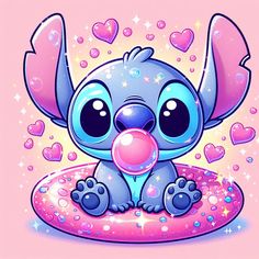 a cute little blue elephant sitting on top of a pink pillow with hearts around it