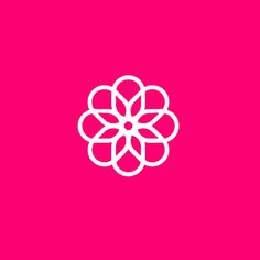 a white flower on a pink background