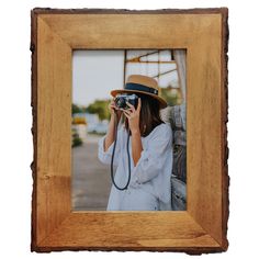 PRICES MAY VARY. LIVE EDGE DESIGN: This wooden picture frame features a live edgewood finish and holds one 5x7 photo. With it's rustic style, this photo frame will bring a touch of the outdoors inside with your favorite farmhouse décor TABLE OR WALL DISPLAY: The back of the frame includes a 2-way easel and 2 trangle hook that allows for vertical or horizontal positioning on your tabletops or wall hanging. Its beautiful rustic design will enhance the feeling of decoration for your kitchen, living Farmhouse Tabletop, Rustic Photo Frames, Live Edge Design, Wood Photo Frame, Wooden Photo Frames, Wooden Picture Frames, Wooden Picture, Table Top Display, Photo On Wood