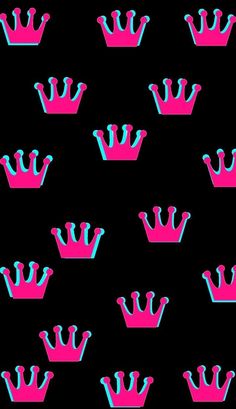 a black background with pink and blue crowns on it's sides, all in the same pattern