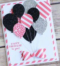 a happy birthday card with some balloons in the shape of mickey mouse's ears