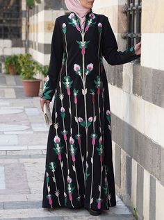 Firdaws Embroidered Abaya Gown Black Long Sleeve Abaya With Floral Embroidery, Black Thobe With Floral Embroidery And Long Sleeves, Black Long Sleeve Thobe With Floral Embroidery, Black Abaya With Floral Embroidery, Black Long Sleeve Kaftan With Floral Embroidery, Fitted Long Sleeve Abaya With Floral Embroidery, Fitted Floral Embroidery Long Sleeve Abaya, Embroidered Long Sleeve Maxi Dress, Fitted Embroidered Long Sleeve Thobe