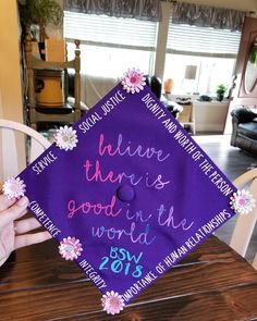 a purple graduation cap that says, there is good in the world