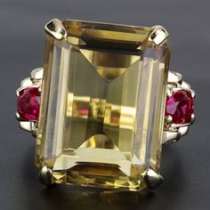 Vintage 14k Yellow Gold Citrine And Ruby Anniversary / Cocktail / Statement Ring This Vintage Ring Is Made Of 14 Karat Yellow Gold & Features An Emerald-Cut Citrine Gemstone In The Center With 2 Oval-Cut Rubies Set At Its Sides. The Ring Is A Size 8.25 And Has "14k" Stamped Onto The Inner Side Of It. This Ring Can Be Resized By Any Qualified Jeweler. Size: 8.25 (Resizable) Weight: 8.24dwt / 12.81g Metal: 14 Karat Yellow Gold Gemstones:1-Emerald Cut Citrine (19mm X 14mm), 2-Round Rubies (6mm X 4mm Each) I-2976 * E-Rso Payment Receipt, Ruby Anniversary, Antique Jewelry Rings, Citrine Gemstone, Vintage Ring, Womens Jewelry Rings, Emerald Cut, Statement Ring, Vintage Watches