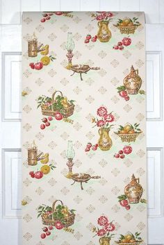 a wall hanging on the side of a door with an image of fruit and vegetables