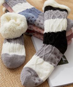 These sassy slipper socks will keep your feet nice and cozy on those cold winter days and nights. Featuring a faux fur lining and a rubber sole design on the bottom to prevent slipping when walking these are sure to be a new favorite part of your lounge wear. Made with a polyester and cotton blend. Comes in 9 fun striped patterns from which to choose.