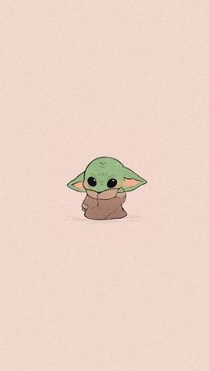 the child yoda from star wars is sitting down and looking at something with big eyes