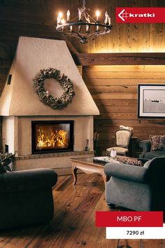 a living room filled with furniture and a fire place next to a wall mounted fireplace