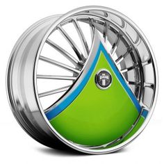 a green and blue wheel with a triangle on the front is shown in this image