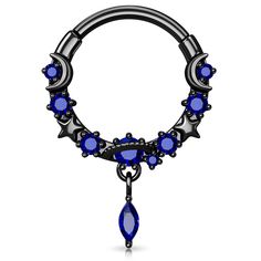 an image of a ring with blue stones on the end and a dangling navel