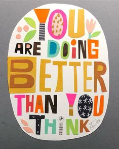 the words you are doing better than you think written in different colors on a piece of paper