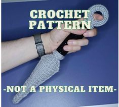 a hand holding an object with the words crochet pattern not a physical item