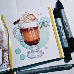 a drawing of a cup of coffee on top of a notebook with markers and pens