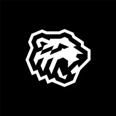 the black and white logo for an organization that has been designed to look like a lion's head