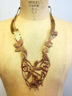 Three piece artisan jewelry set. Art Nouveau revival, fantasy, rainforest... Brass and copper. Brutalist. Large necklace, cuff bracelet, pierced earrings. I have been trying to pin down more precise date/designer with little luck. Came in a Neimans box but may have just been stored in a Neimans box. I've not seen another like it. Will offer for a short time before packing away because I would like to style this with some early 1910s-20s garments. Moths, butterflies, bees, lizard (gecko) botanica Handmade Nature-inspired Jewelry, Handmade Bronze Fantasy Jewelry, Gold Leaf-shaped Copper Jewelry, Handmade Metal Leaf Jewelry, One-of-a-kind Artistic Brass Jewelry, Handmade Leaf-shaped Metal Jewelry, Artistic One-of-a-kind Brass Jewelry, Handmade Bronze Leaf Jewelry, Unique Brass Jewelry With Lost Wax Casting