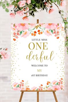 a sign that says, little miss one beautiful welcome to my 1st birthday with flowers on it