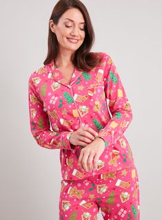 Pretty in pink and crammed full of festive food, these pure cotton PJs are bound to get you in the festive spirit. In a traditional cut, they've got an all-over print of gingerbread biscuits in the shape of Christmas trees, stars, stockings and presents, as well as gingerbread men wearing Santa hats. The best thing about them? They also come in kids sizes (coming soon), so your little partners in crime can match you in your festive finery. Mini Me Pink Christmas gingerbread pyjamas 1 x Long slee Pink Christmas Gingerbread, Gingerbread Biscuits, Pink Ginger, Xmas Pajamas, Festive Food, Cotton Pjs, Tu Clothing, Christmas Outfits Women, Womens Christmas