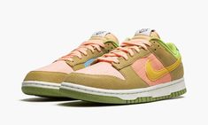 The Nike Dunk Low “Sun Club” is one of several summer-ready colorways of the vintage basketball shoe from Nike’s “Sun Club” collection.  This May 2022 release gives the popular Dunk a warm weather inspired makeover, and it doesn’t disappoint, to say the least.  The shoe features tan full-grain leather overlays against a multicolor canvas base.  Multicolor leather Swooshes appear on either side of the shoe.  Nike supplies “Nike Sun Club” branding on the tongue, while the heel is treated to a fun Nike Custom Sneakers With Gum Sole For Spring, Custom Summer Sneakers With Rubber Sole For Streetwear, Custom Summer Streetwear Sneakers With Rubber Sole, Summer Streetwear Custom Sneakers With Rubber Sole, Sporty Sneakers With Gum Sole For Summer, Sporty Summer Sneakers With Gum Sole, Sporty Sneakers For Summer Streetwear, Sporty Streetwear Sneakers For Summer, Sporty Summer Streetwear Sneakers